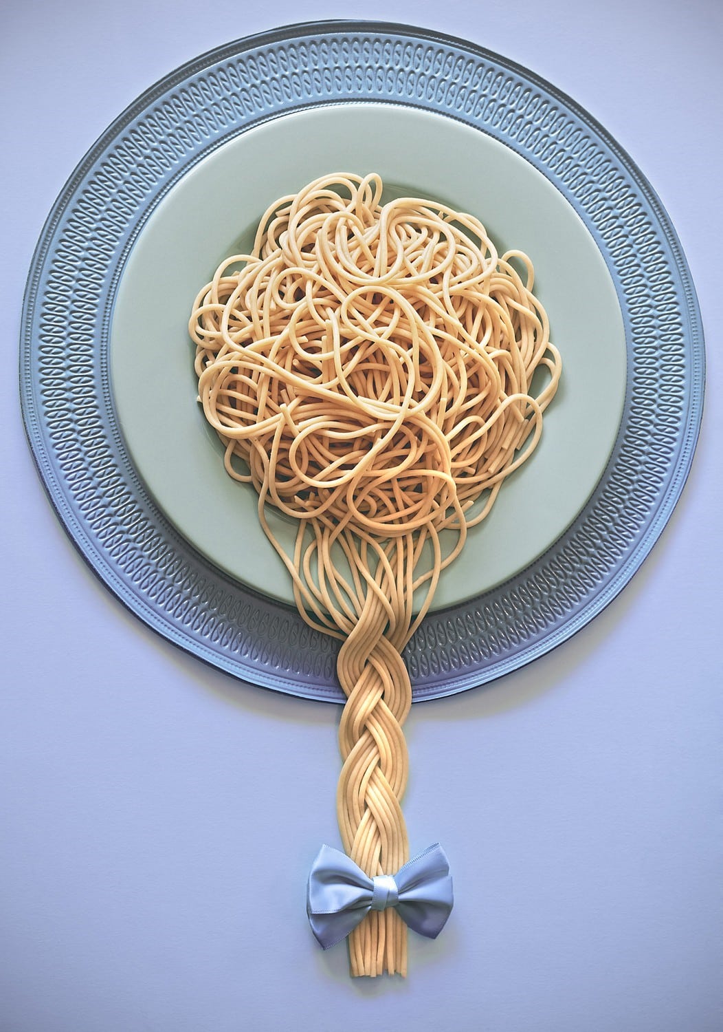 Plate of spaghetti with a braid